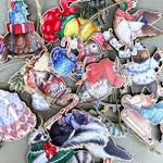 Load image into Gallery viewer, Festive Skunk Wooden Ornament
