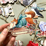 Load image into Gallery viewer, Festive Fox Wooden Ornament
