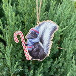 Load image into Gallery viewer, Festive Skunk Wooden Ornament
